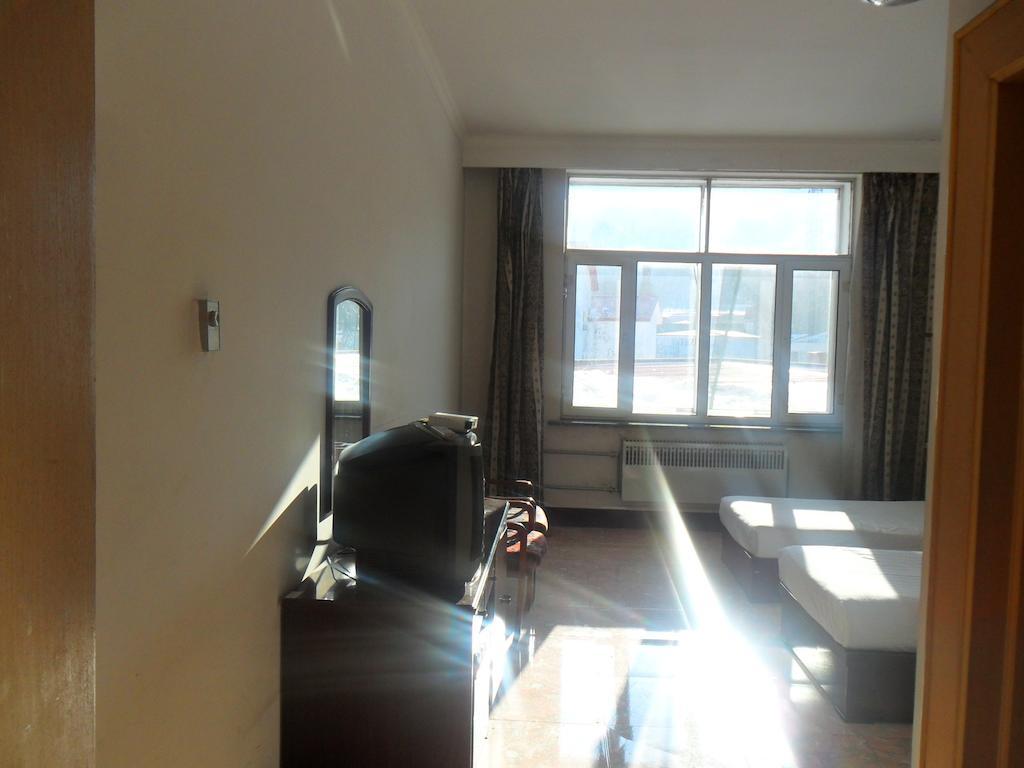 Yabuli Xintong Hotel Shangzhi Quarto foto