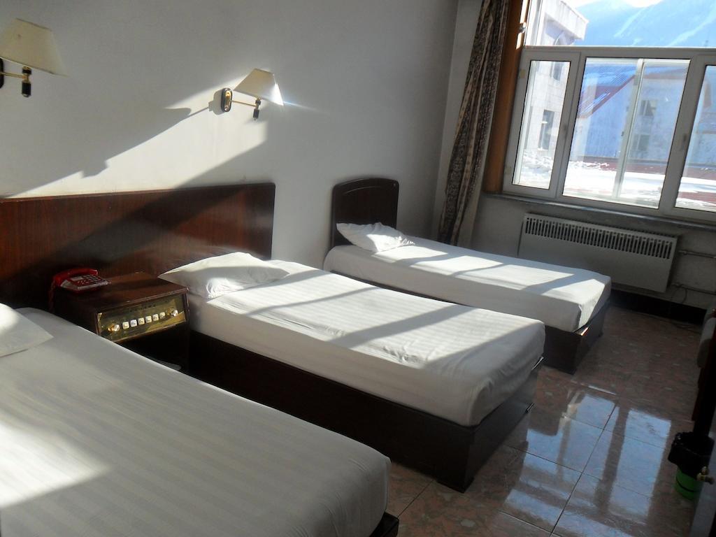 Yabuli Xintong Hotel Shangzhi Quarto foto